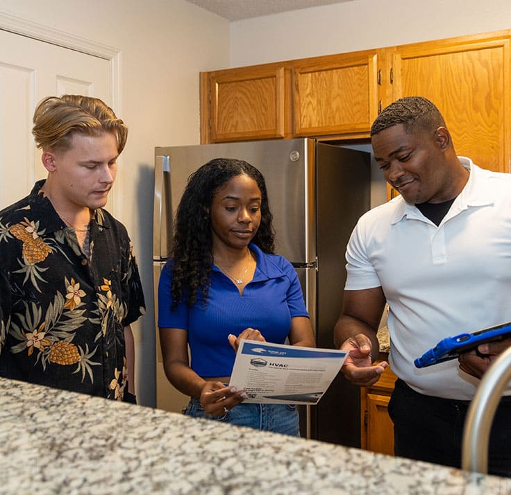 a group of people looking at the camera